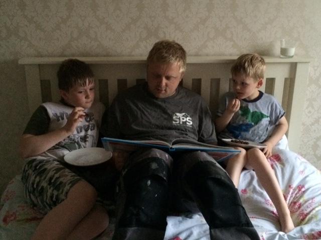 Craig Simpson reading to sons Jake, aged 10, and Liam, aged 5. We enjoy reading and after a long day at work, it's good to spend time with them by reading a bedtime story while they enjoy their supper. Our favourite bedtime book contains classic stories.