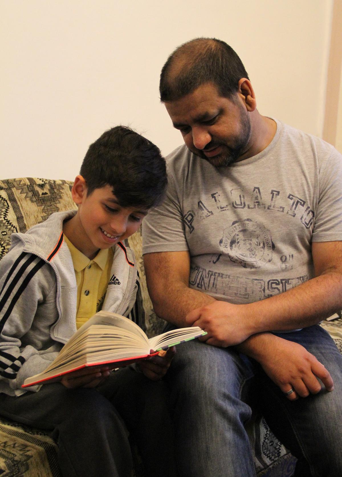 Mohammed a Rauf reading to his son Haroon, aged 9. Their favourite book to read is Demon Dentist by David Walliams. At the moment we love reading through a collection of books by the National Geographic Society - Weird but true!