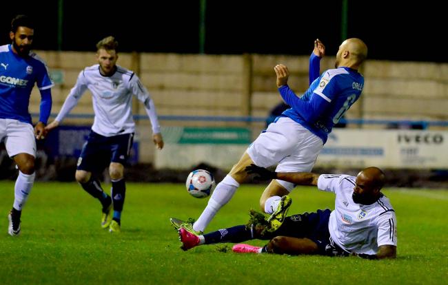 Mark Bower will check on Emile Sinclair – pictured tackling Dover's Richard Orlu – who was carrying a knock in the FA Trophy replay