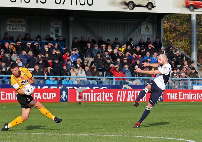 Will Hatfield hammers home against Cambridge. Guiseley's second round tie against Fleetwood will be screened live   Picture: Alex Daniel