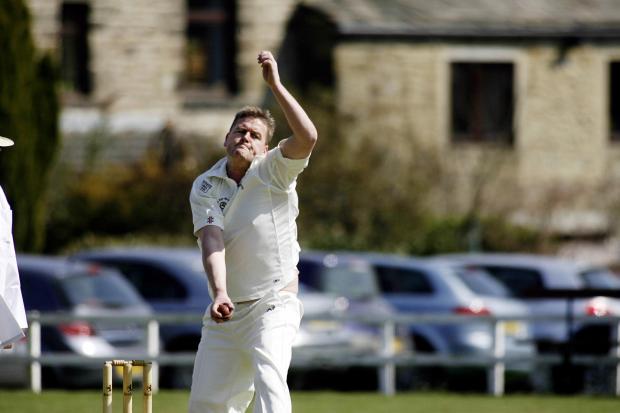 Damian Rowell bowls for Haworth in the Craven League. Pic: Bob Smith